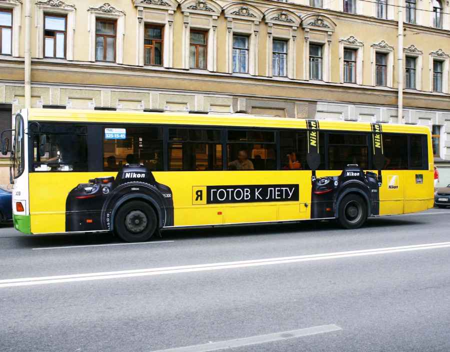 TMG Nikon  наружная реклама на транспорте Петербург